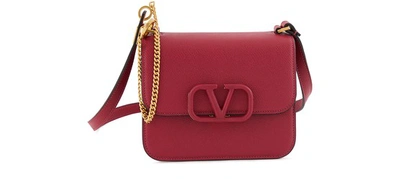 Shop Valentino Garavani Small V Sling Bag In Raspberry Pink
