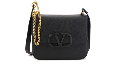 Shop Valentino Garavani - Small V Sling Bag In Nero