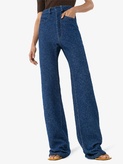 Shop Alled Martínez Denim Effect Flared Trousers In Blue