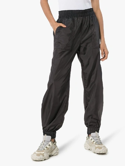 Shop Ganni Patch Pocket Track Pants In Black