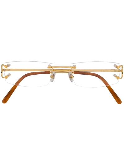 Shop Cartier Rectangular Frame Glasses In Gold