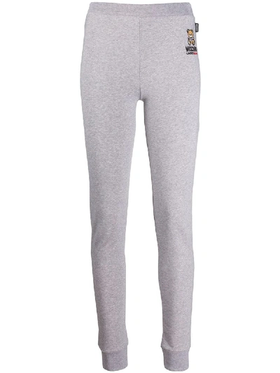 Shop Moschino Underbear Track Pants In Grey