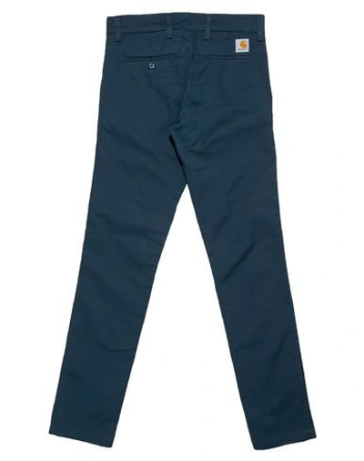 Shop Carhartt Casual Pants In Deep Jade