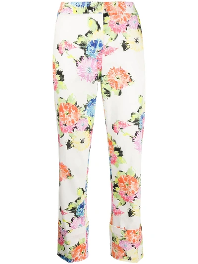 Shop Blumarine Floral Print Trousers In White