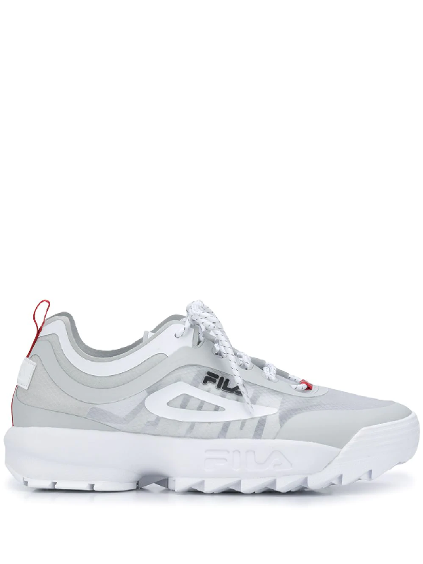 fila disruptor trainers in white