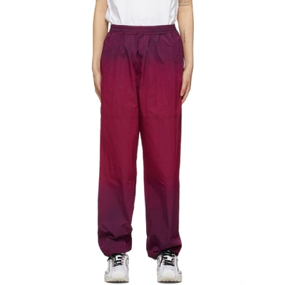 Shop Aries Pink Ombre Dyed Windcheater Track Pants In Fuschia