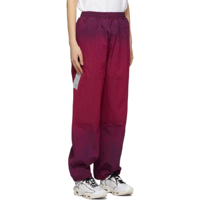 Shop Aries Pink Ombre Dyed Windcheater Track Pants In Fuschia