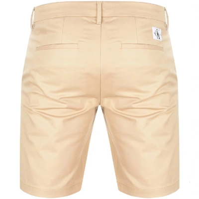 Shop Calvin Klein Jeans Slim Fit Chino Shorts Beige