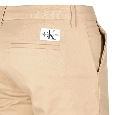 Shop Calvin Klein Jeans Slim Fit Chino Shorts Beige