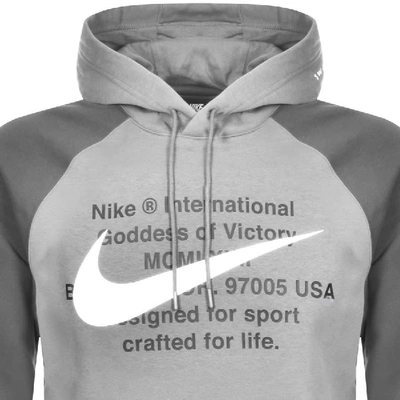 Shop Nike Swoosh Logo Hoodie Grey