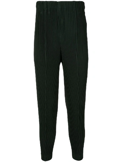 Shop Issey Miyake Helio Ribbed Knit Trousers In Green