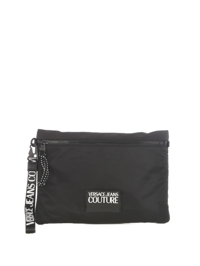 Shop Versace Jeans Couture Logo Wristlet Clutch In Black