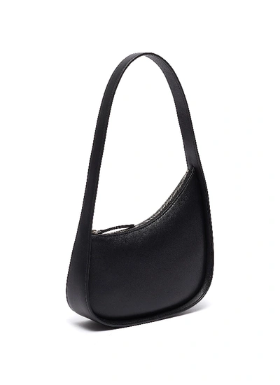 Shop The Row Half Moon Leather Bag In Black