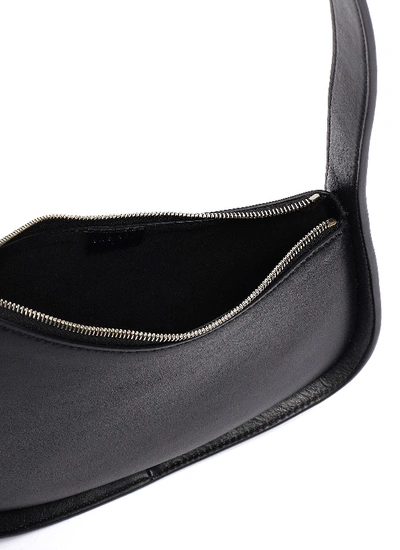 Shop The Row Half Moon Leather Bag In Black