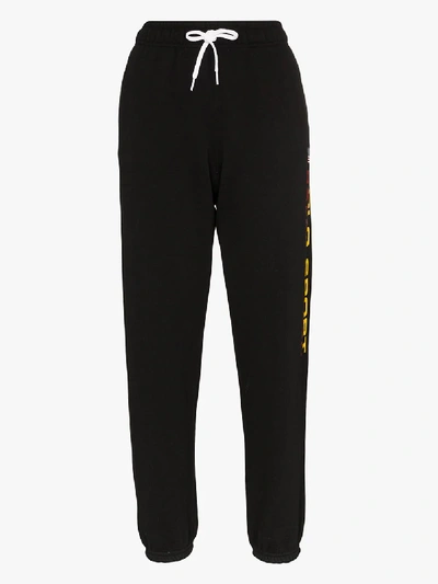 Shop Polo Ralph Lauren Logo Print Fleece Track Pants In Black