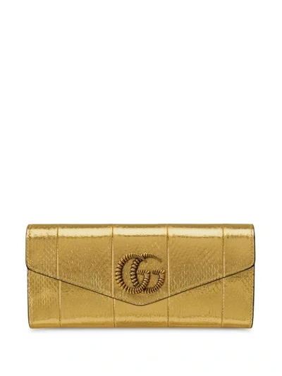 Shop Gucci Broadway Double G Clutch In Gold