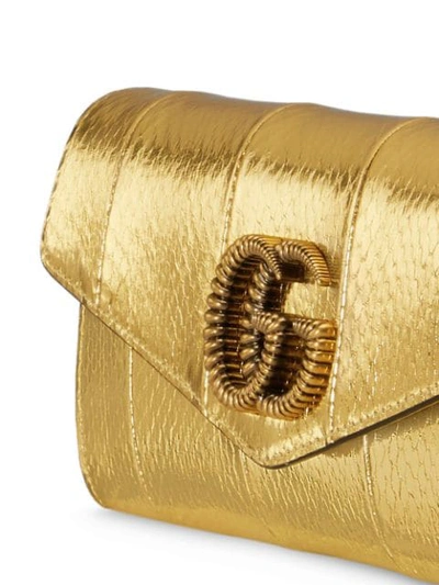 Shop Gucci Broadway Double G Clutch In Gold