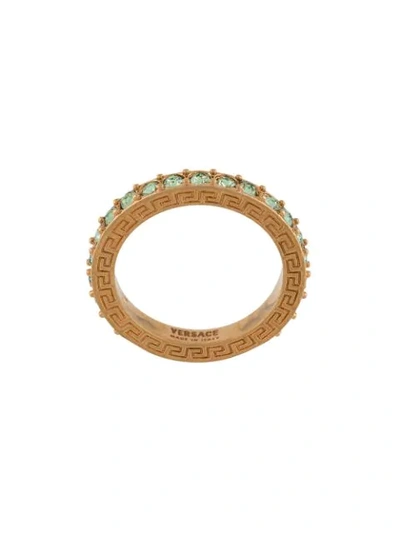 Shop Versace Embellished Logo Ring In Gold
