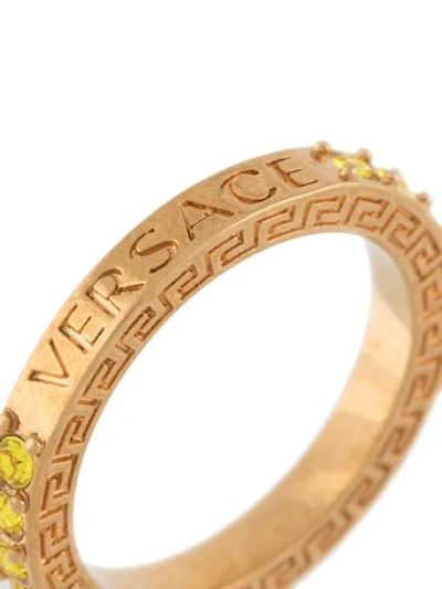 Shop Versace Logo Embellished Ring In Gold