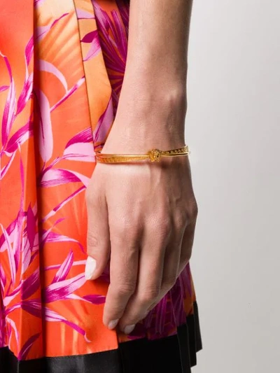 Shop Versace Greca Medusa Head Bracelet In Gold