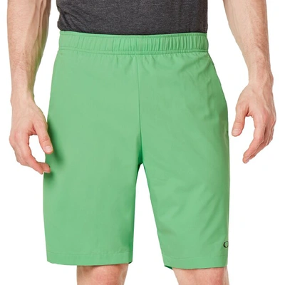 Shop Oakley Enhance Woven Shorts 9.7 In Green