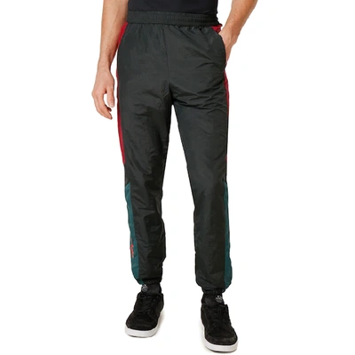 Shop Oakley Nylon Track Pant In Dull Onyx