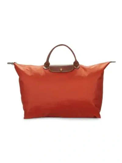 Shop Longchamp Le Pliage Original Leather Travel Bag In Orange