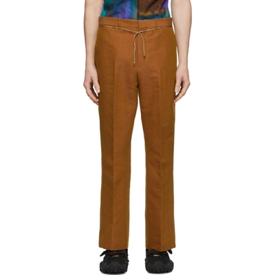Shop Acne Studios Orange Bootcut Trousers In Apricotoran