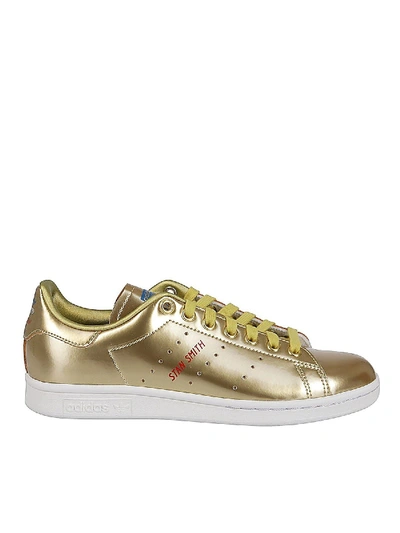 Shop Adidas Originals Stan Smith Sneakers In Gold