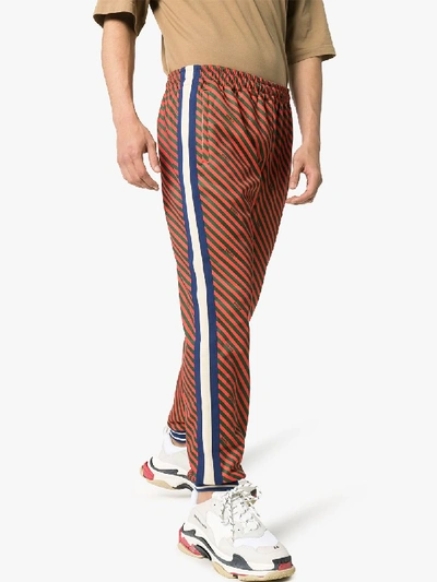Shop Gucci Loose Striped Jogging Pant In Red