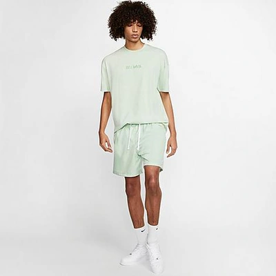 Shop Nike Men's Sportswear Flow Woven Shorts In Green