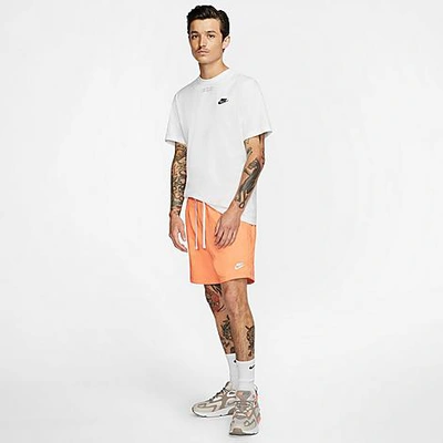 Shop Nike Men's Sportswear Flow Woven Shorts In Orange