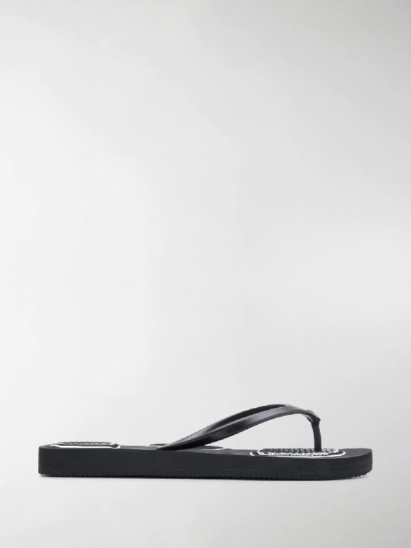 black beach flip flops