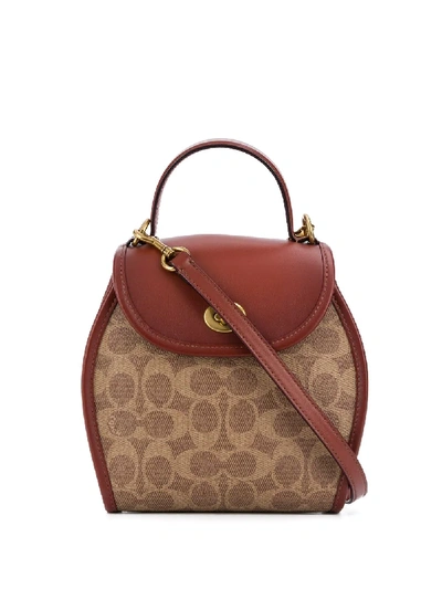 Shop Coach Turnlock Top Handle Tote In Brown