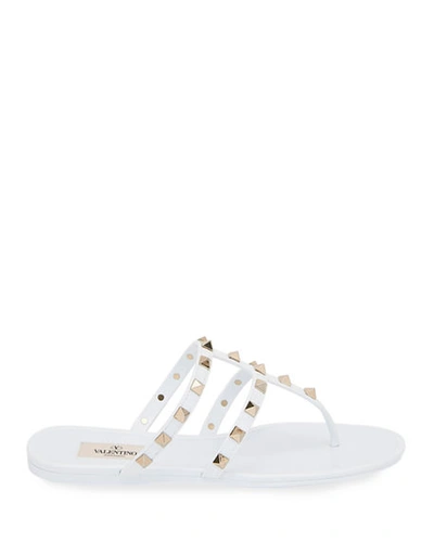 Shop Valentino Summer Rockstud Jelly Sandals In White