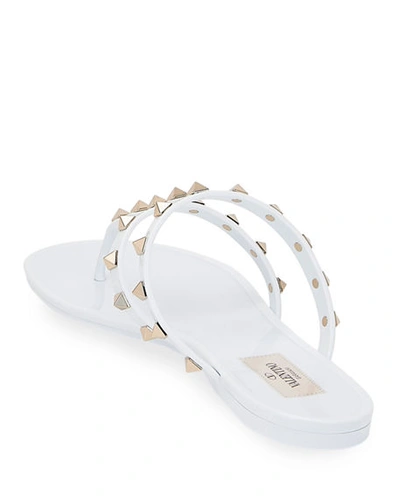 Shop Valentino Summer Rockstud Jelly Sandals In White