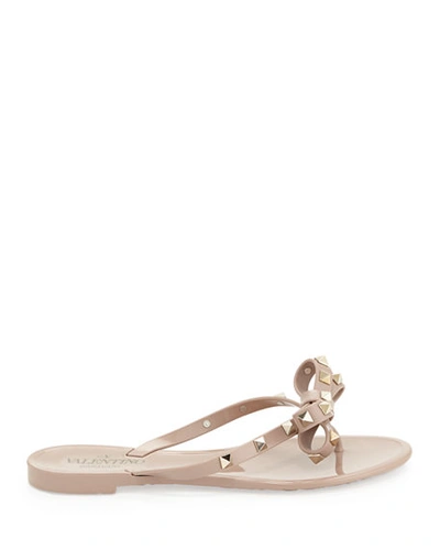 Shop Valentino Rockstud Pvc Flat Thong Sandals In Poudre