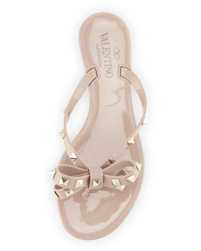 Shop Valentino Rockstud Pvc Flat Thong Sandals In Poudre