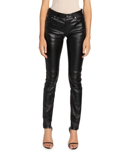 Shop Saint Laurent Leather Skinny Jeans In Black