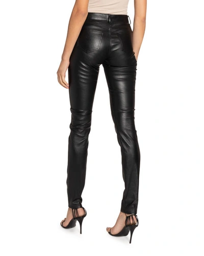 Shop Saint Laurent Leather Skinny Jeans In Black