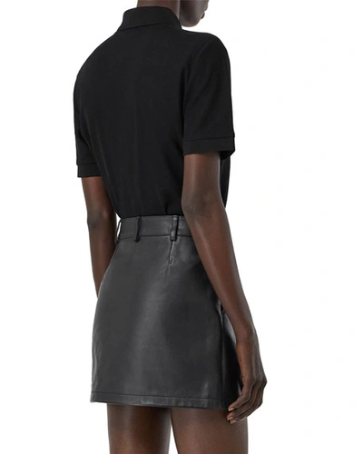 Shop Burberry Femme-fit Ring-snap Cotton Polo Shirt, Black