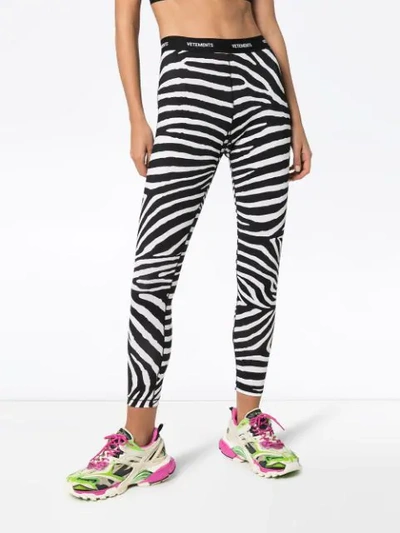 Shop Vetements Zebra-print Logo Waistband Leggings In Black