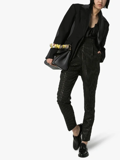 Shop Saint Laurent High Waist Pinstripe Pleated Trousers In Black