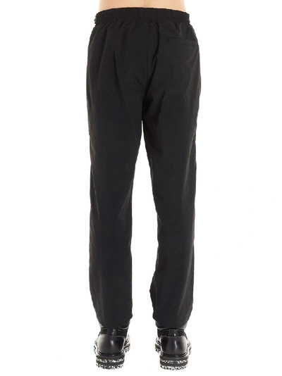 A-cold-wall* Logo Print Taped Nylon Track Pants In Black