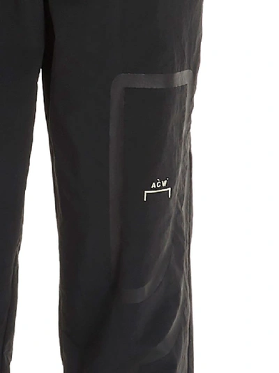 A-cold-wall* Logo Print Taped Nylon Track Pants In Black