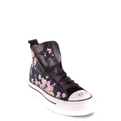 Shop Converse Black Leather Hi Top Sneakers