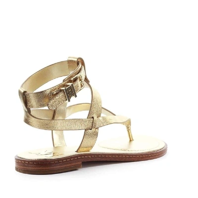 Shop Michael Kors Gold Sandals