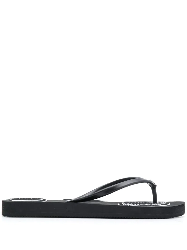 black beach flip flops