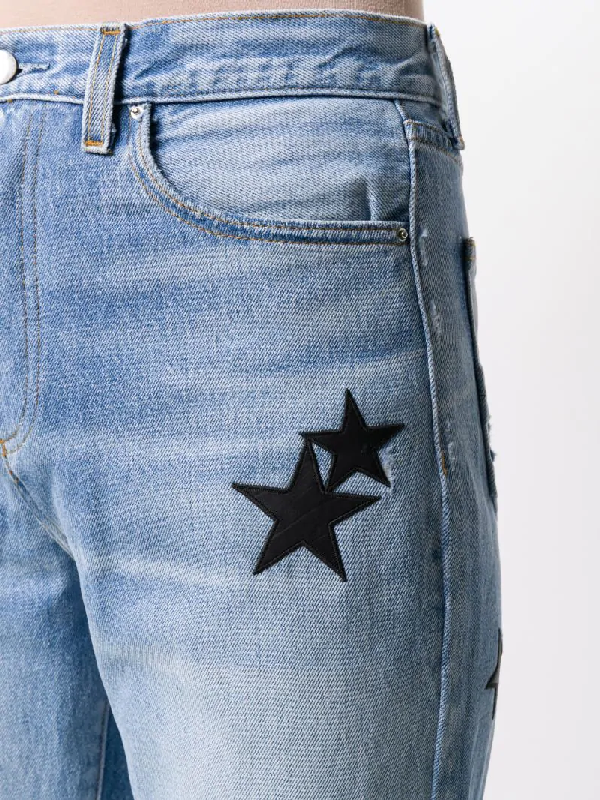 Amiri Star Patch Flared Jeans In Blue | ModeSens