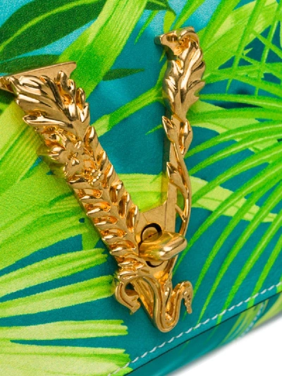 Shop Versace Tropical Print Flap Clutch In Green